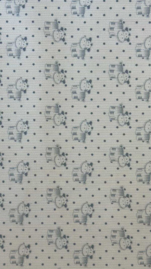 Tejido infantil pique con estampado vacas en azul